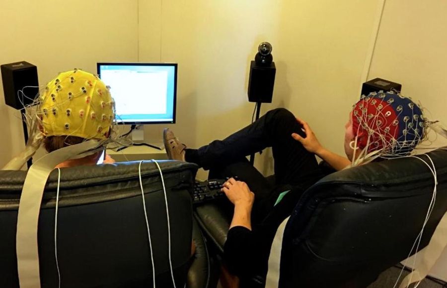 Photo of a two-person neuroscience experiment prototyping session